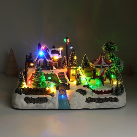 Souvenir plastic light "Carousel at the Christmas tree" is spinning 35x20x19 cm