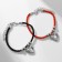 Set 3 objects: 2 bracelets, lip gloat "Demetrons" hearts, black-red color, 6 cm