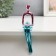 Polystone souvenir "Man with a ball" pink-blue 5.6x9x23 cm
