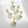 Charm "Flower" rose with a curl, the color is green and white in gold