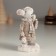 Polystone souvenir "White mouse with purchases in the hands" 5.5x4x10 cm