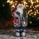 Santa Claus "In a white-red fur coat with a strap, with skis" 30 cm