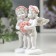 Polystone souvenir "Angels in pink wreaths with heart from roses" 10x8.5x5.5 cm