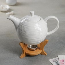 A porcelain teapot on a wooden stand of the “strip” shares, 850 ml, white color