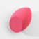 Doll Face sponge on a plastic stand for drying and storage