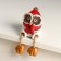 Souvenir Ceramics "Avois in a red scarf with hanging legs" 7.2x7.3x8 cm