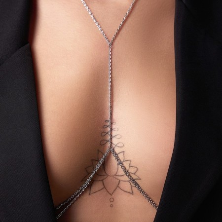 Erotic accessory on the chest, silver