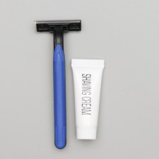 A razor of extras with two stainless blades with a moisturizing strip, shaving cream10 gr.