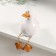 Souvenir ceramics "White duckling with hanging paws" 8.6x11.1x12.1 cm