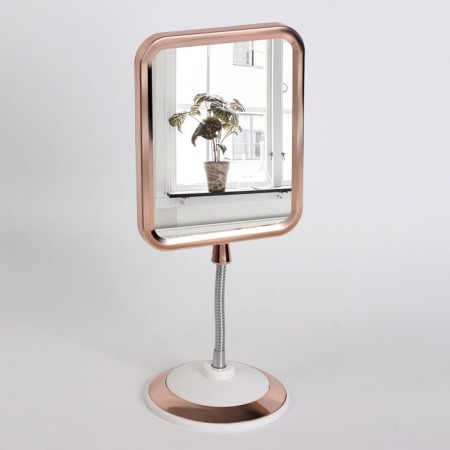 The mirror is desktop, on a flexible leg, bilateral, with an increase, a mirror surface 12.5 × 16 cm, the color of copper/white