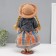 Doll Collectible Ceramics "Vika in a checkered multi -colored skirt" 39 cm
