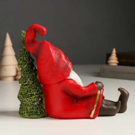 Souvenir Polystone Light "Santa Claus in a red outfit sits at the Christmas tree" 14x7x18 cm-3