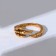 Ring "ring" claws, color black gold, dimensionless