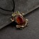 Piece "Frog", brass, amber