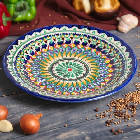 Plate of the Rishtan ceramics "Flowers", 25 cm, blue