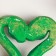 Figure with the suspension "couple of snakes" light green, 9.5x7.5cm