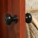 Plastic door handle, D = 70, black with a pattern