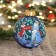 A ball with a manual painting of 100 mm "Santa Claus and Snow Maiden"