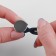 A button for expanding the belt, 17 mm, silver color