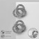 Earrings with rhinestones "Spiral" circle, white color in silver