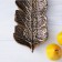 Daille of the Golden Leaf, 37 × 14 cm, bronze color.
