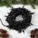 Garland “thread” 10 m, IP65, UMS, dark rubber thread, 100 LED, white glow, flicker, 220 V