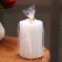 Candle-cylinder with faces, 5x7.5 cm, pearl, 6 hours