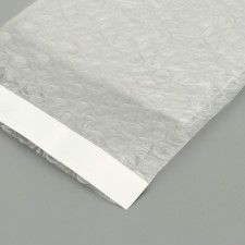A package from a runway with a valve and an adhesive layer, p/e, 3 layers, 18 x 26 + 5 cm
