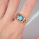 Ring "turquoise world" relief, color gold, dimensionless
