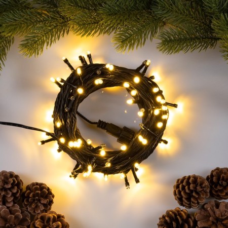 Garland “thread” 10 m, IP44, UMS, dark thread, 100 LED, warm white glow, flickering all LEDs, 24 V