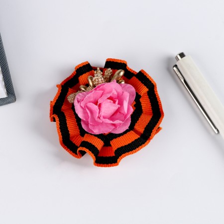 Icon "May 9" with a flower-2