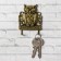 The wall -mounted Key "I am protecting the house", 6 x 8 cm.