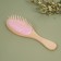 Massage comb, 7 × 22 cm, beige/pink color