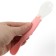 A spoon of children's silicone for feeding, pink color