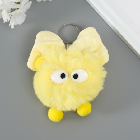 Fluffy on the ring "Masya with a large bow" yellow 12x8x8 cm-1