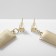 Emall earrings "cards" peaks, black and white color in gold