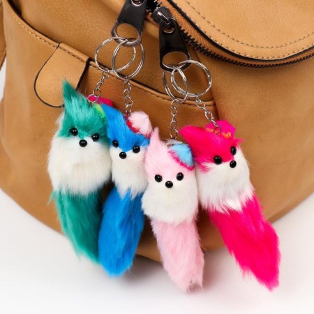 Fluffy on the ring "in a rainbow hat with a rhinestone", mix