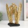 Polystone souvenir "Matter surfing" gold 26x23.5x12.5 cm