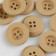 A set of buttons, 4 punctures, d = 22 mm, 10 pcs, beige color