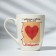 Ceramic mug with a spoon "Grandma", 310 ml, white color