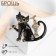 Brooch "Cat" with a fish, black color in gold