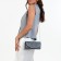 Female bag, valve department, long chain, silver color