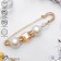 Pin "Cube" 6.5cm, white-brown color in gold
