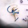 Brooch "Gymnast" with a ribbon, the color is blue in gold