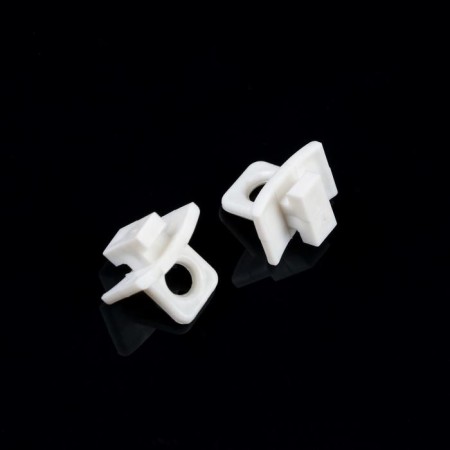 A plug on the cornice, 15x15x10 mm, plastic, white color