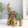 Polystone souvenir "Elephant with an elephant - Red -green ass with rubies" 13.5x8.5x15.5 cm