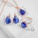 Set 3 objects: earrings, pendant, ring dimensionless "Edel" drop, blue color in gold, 45 cm
