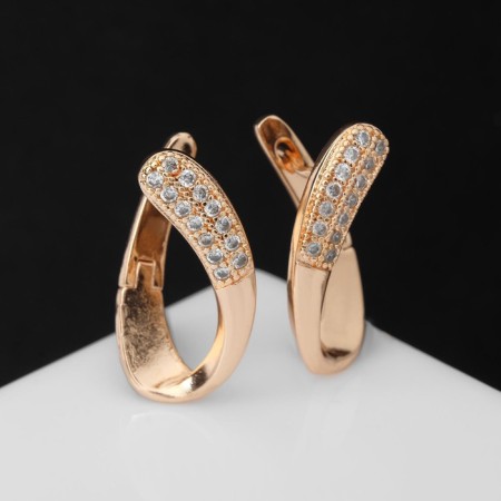 Earrings with rhinestones "Magic" curl, white color in gold-2