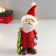 Souvenir Polystone "Santa Claus in red, with a curly beard with a Christmas tree" 15x6x8 cm