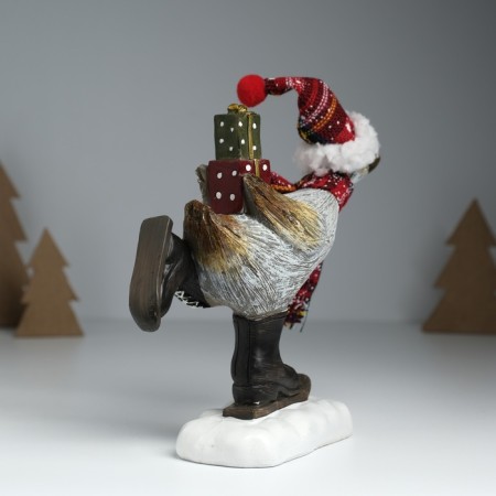 Polystone souvenir "Goose in a cap, knitted scarf, on mini-covers, with gifts" 6.5x19.5x17 cm 10325-3